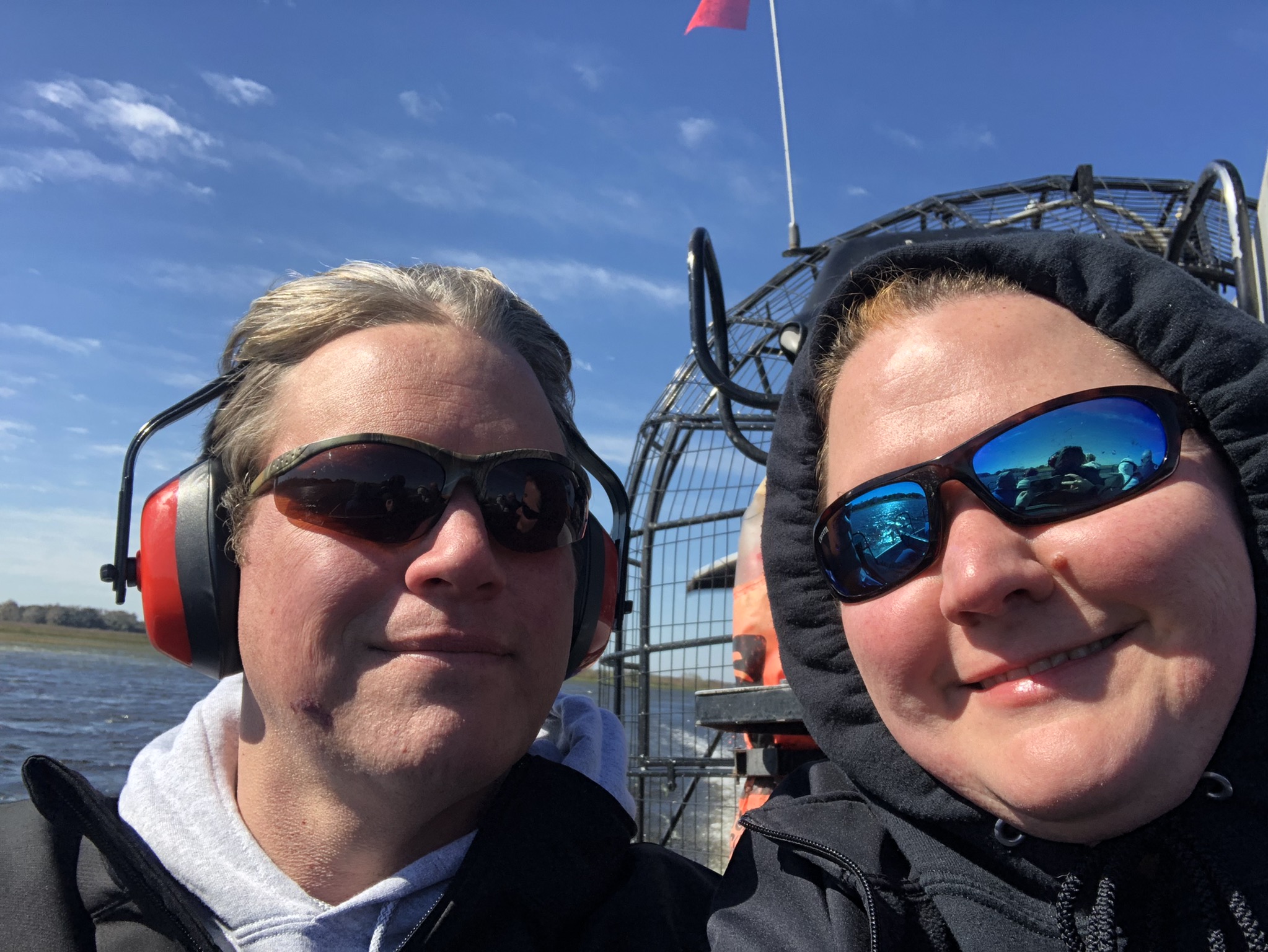 My husband and I on the airboats at Boggy Creek Ai...