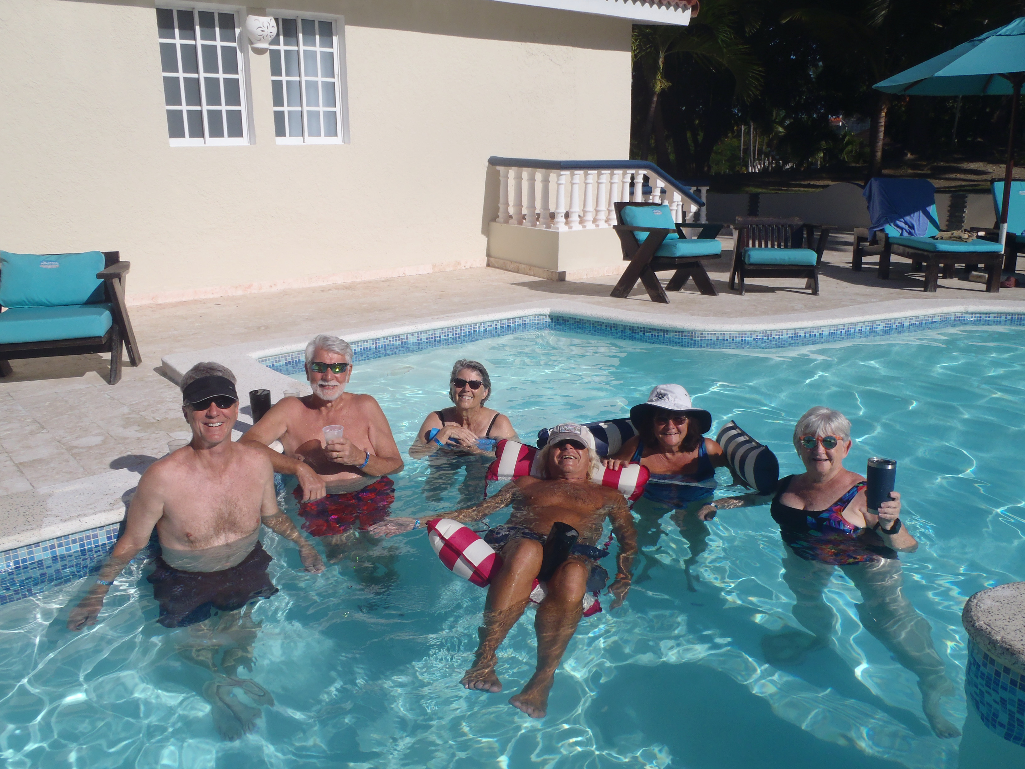 All six travelers at pool located within LHVC...