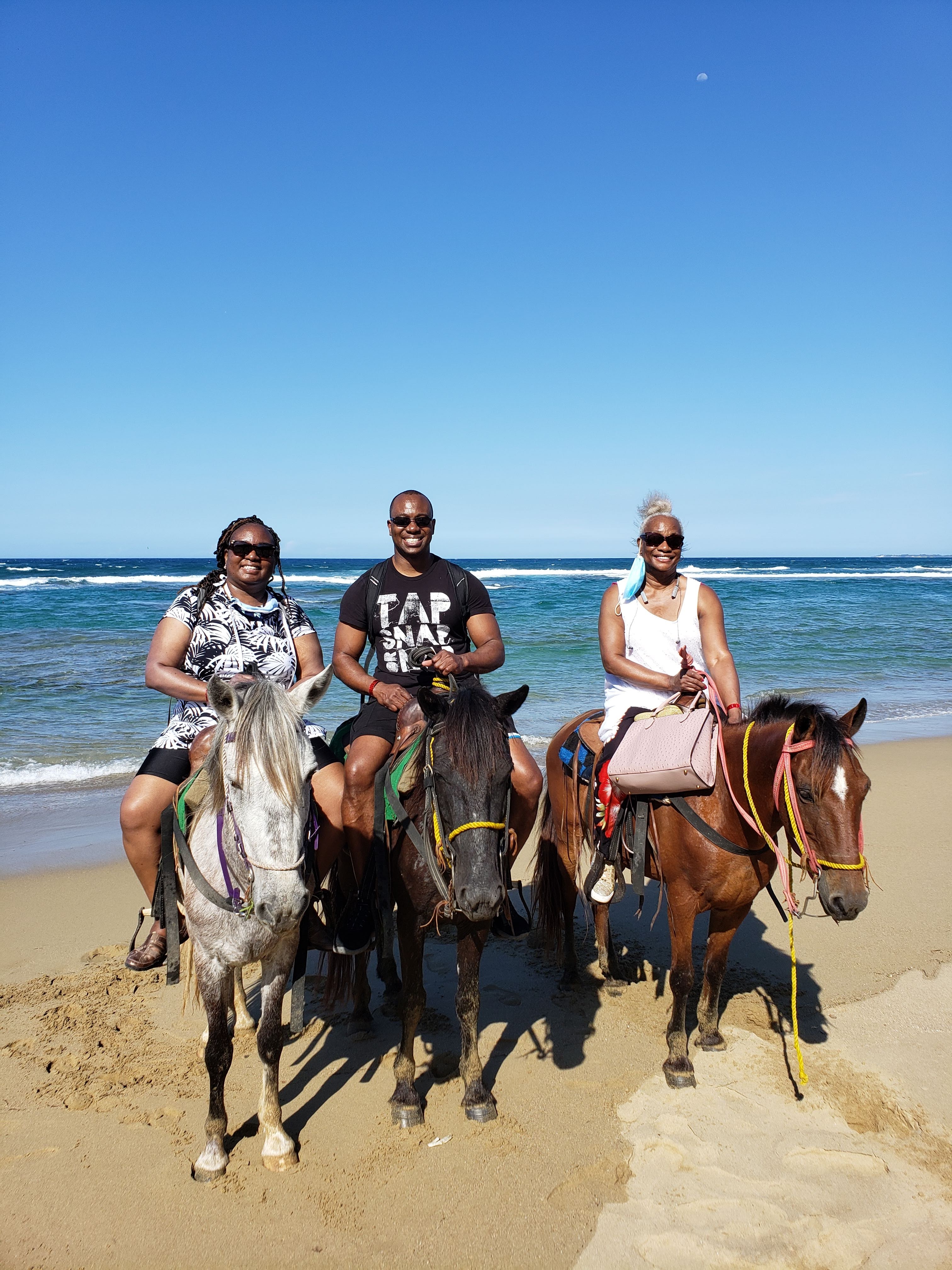 Horse back riding on beach in Peurta Plata with my...