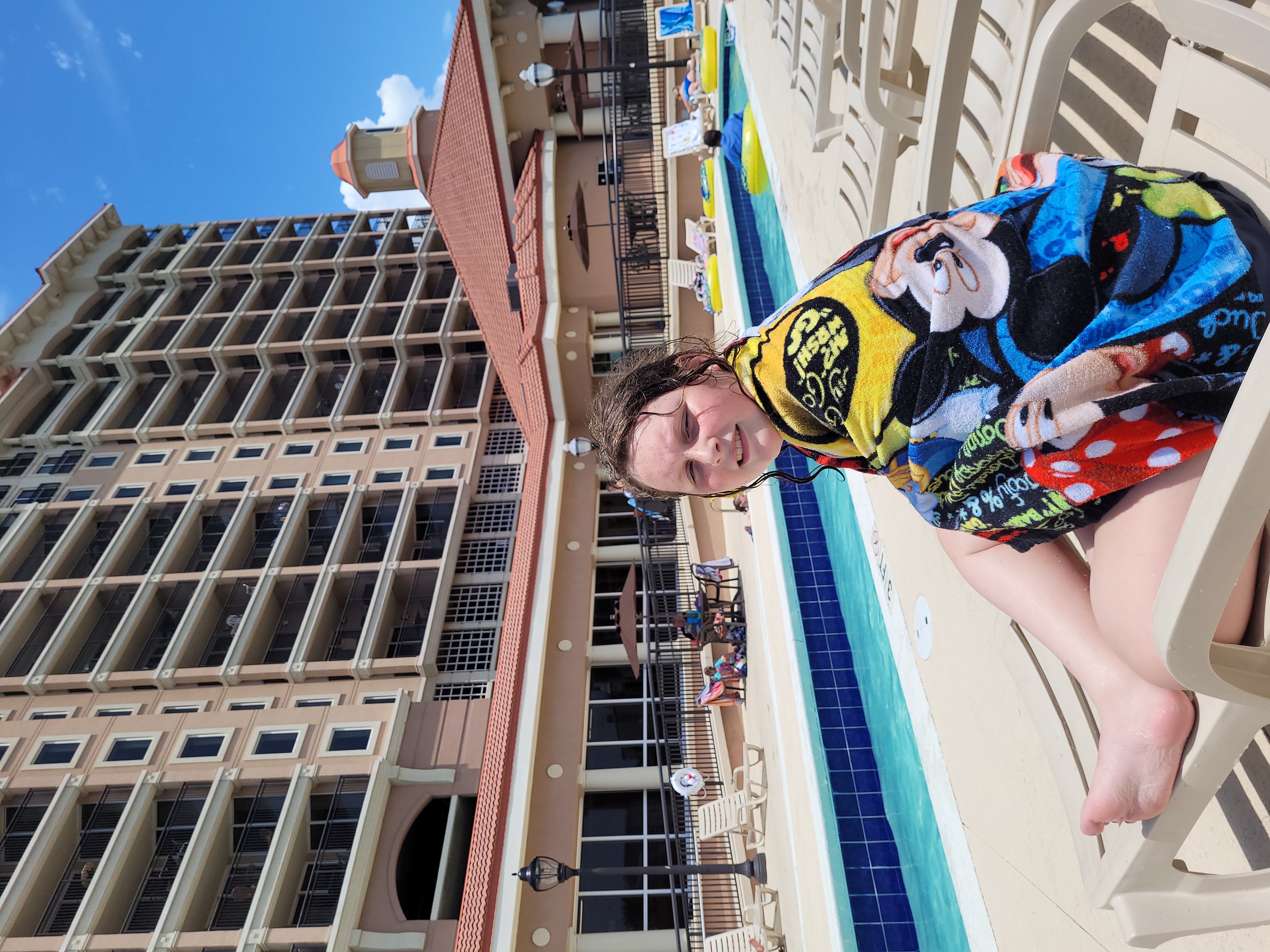 My daughter on tilghman beach and golf resort pool...