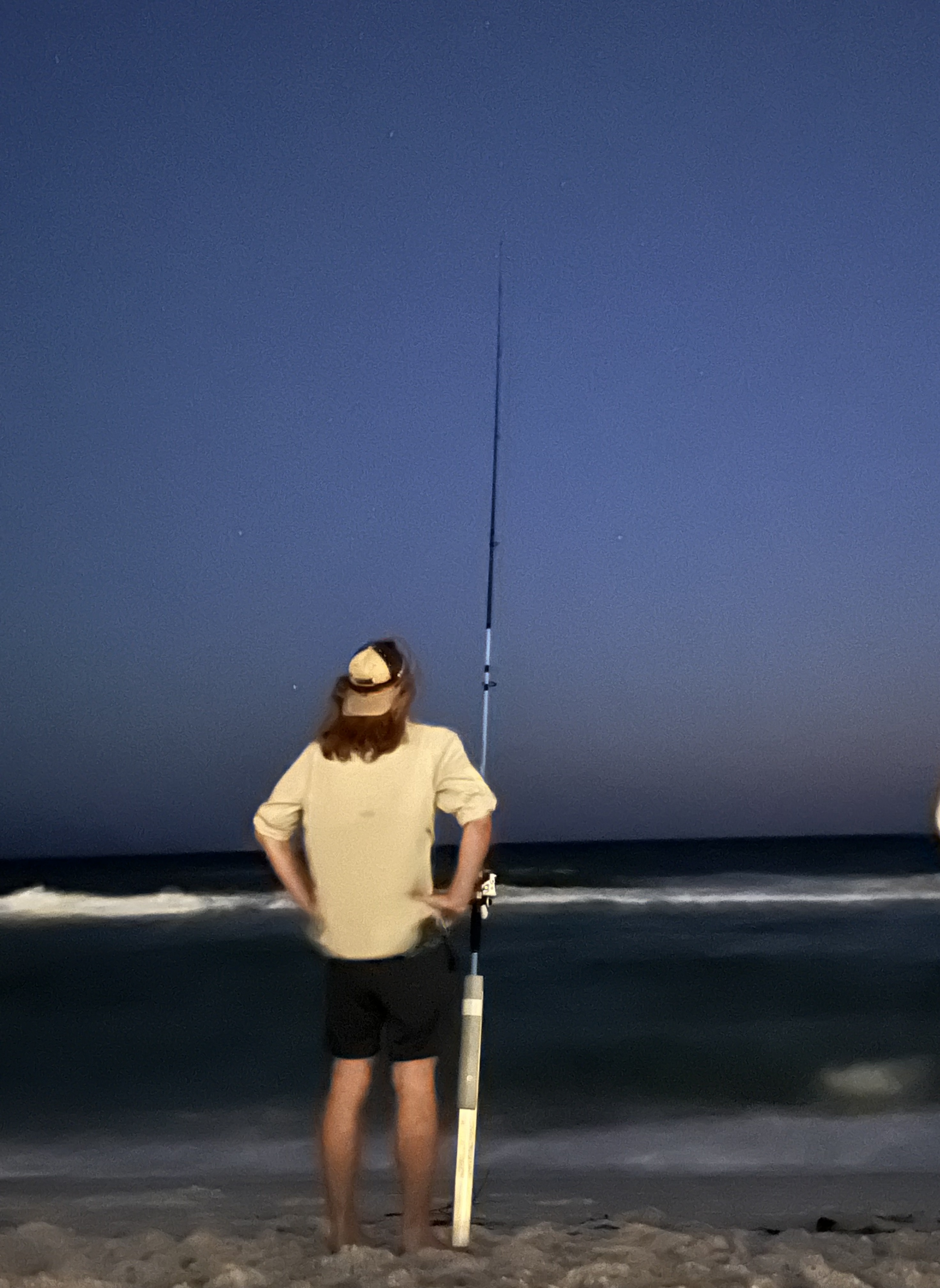 My son, Byron, shark fishing at night. One of our ...