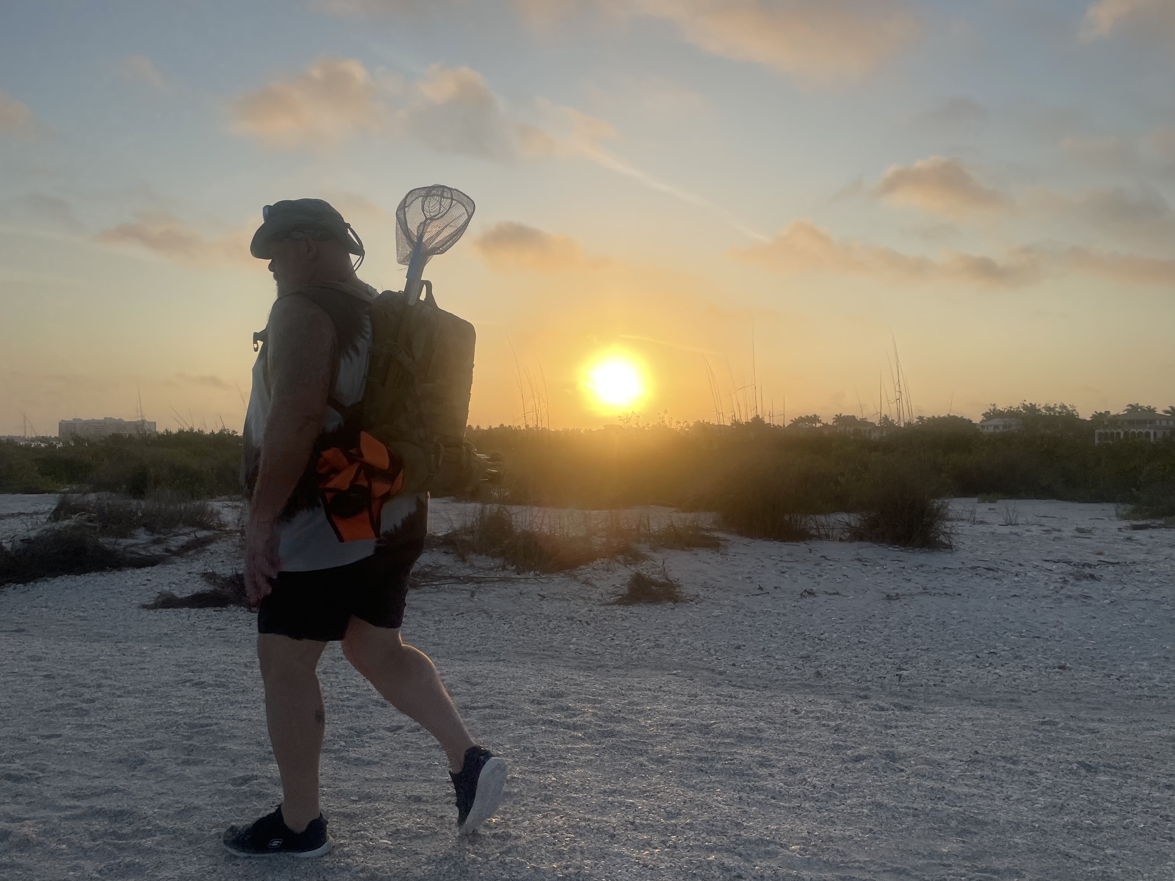 Walking in the beach of Marco Island to go find so...