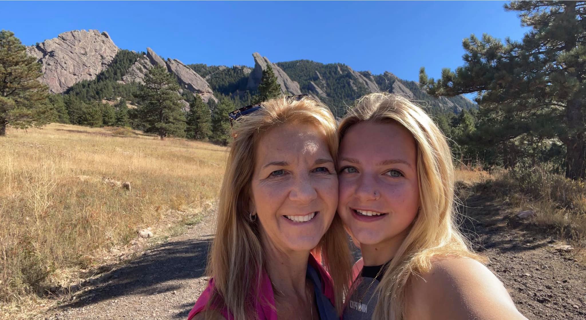 My daughter and I hiking near the Flatirons in Bou...