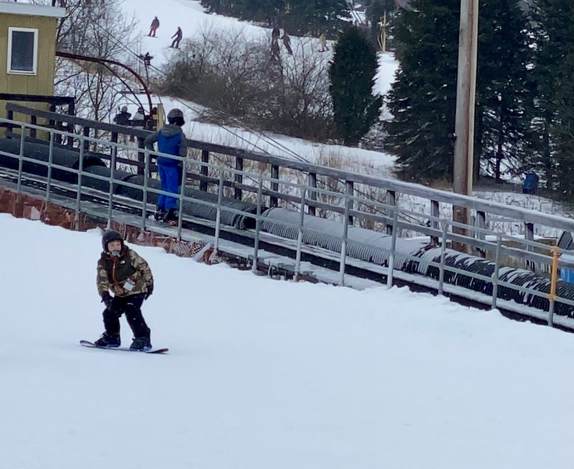 Wilson learning how to snowboard at Blue Mountain ...