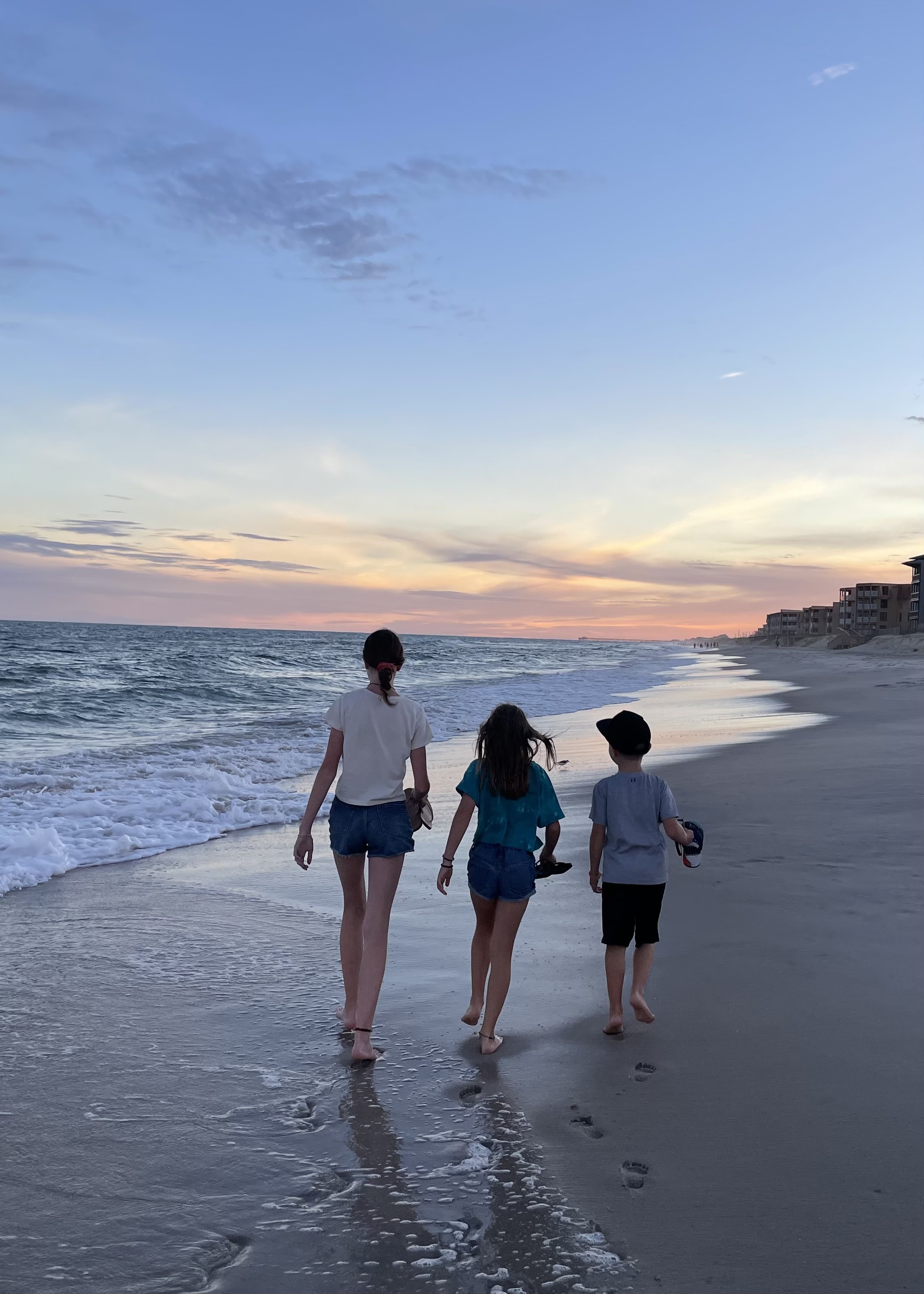 Family walk on the beach as the sun was setting....