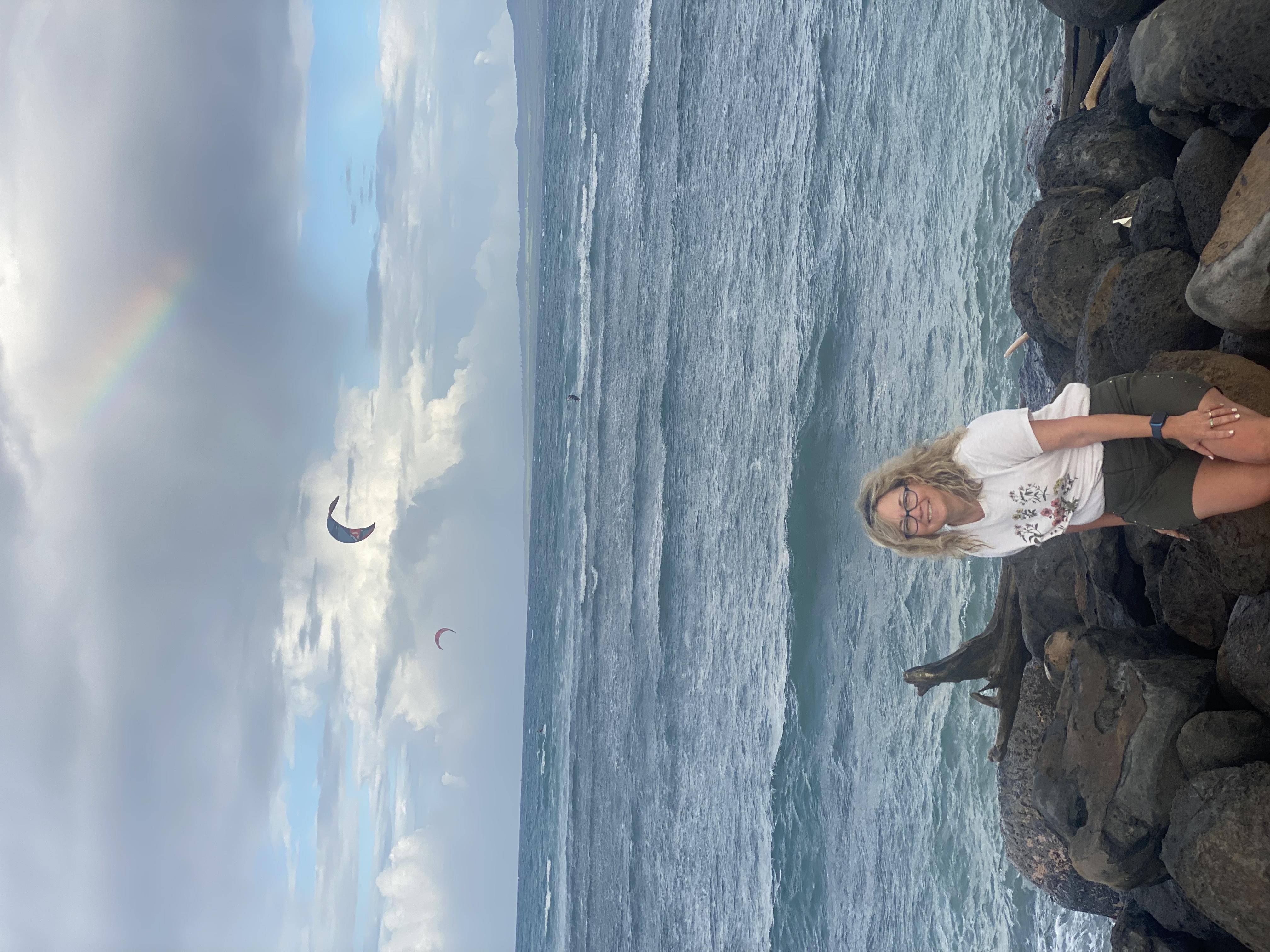 Enjoying the beautiful Maui weather, wind surfers ...