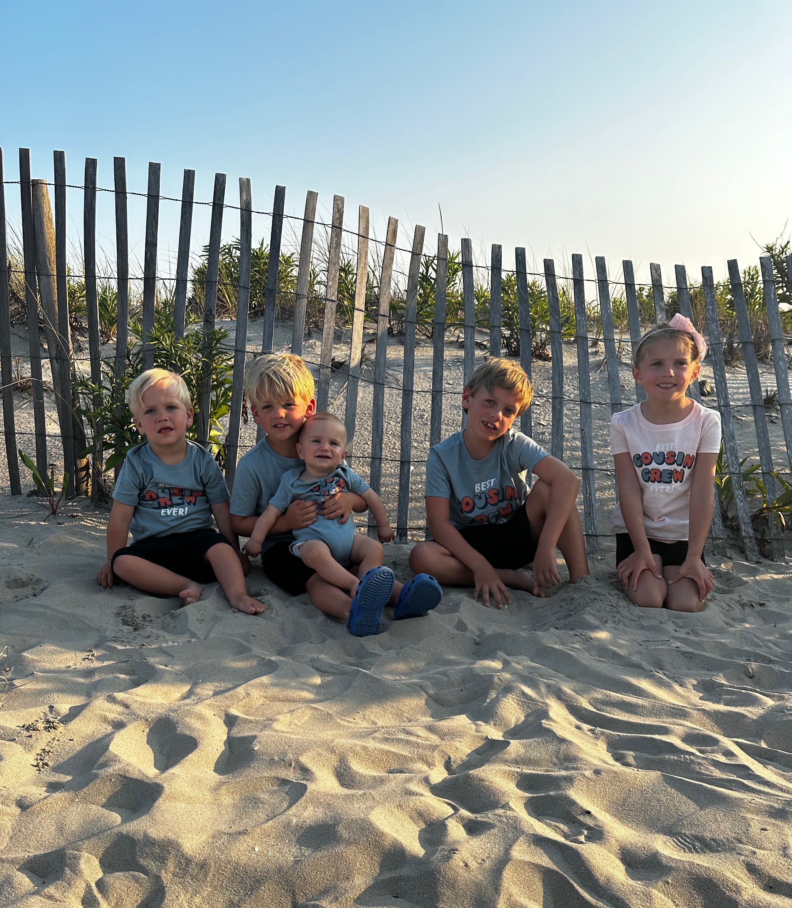 The four cousin princes and their princess cousin posing for a photo in between beach days in Ocean City, NJ.