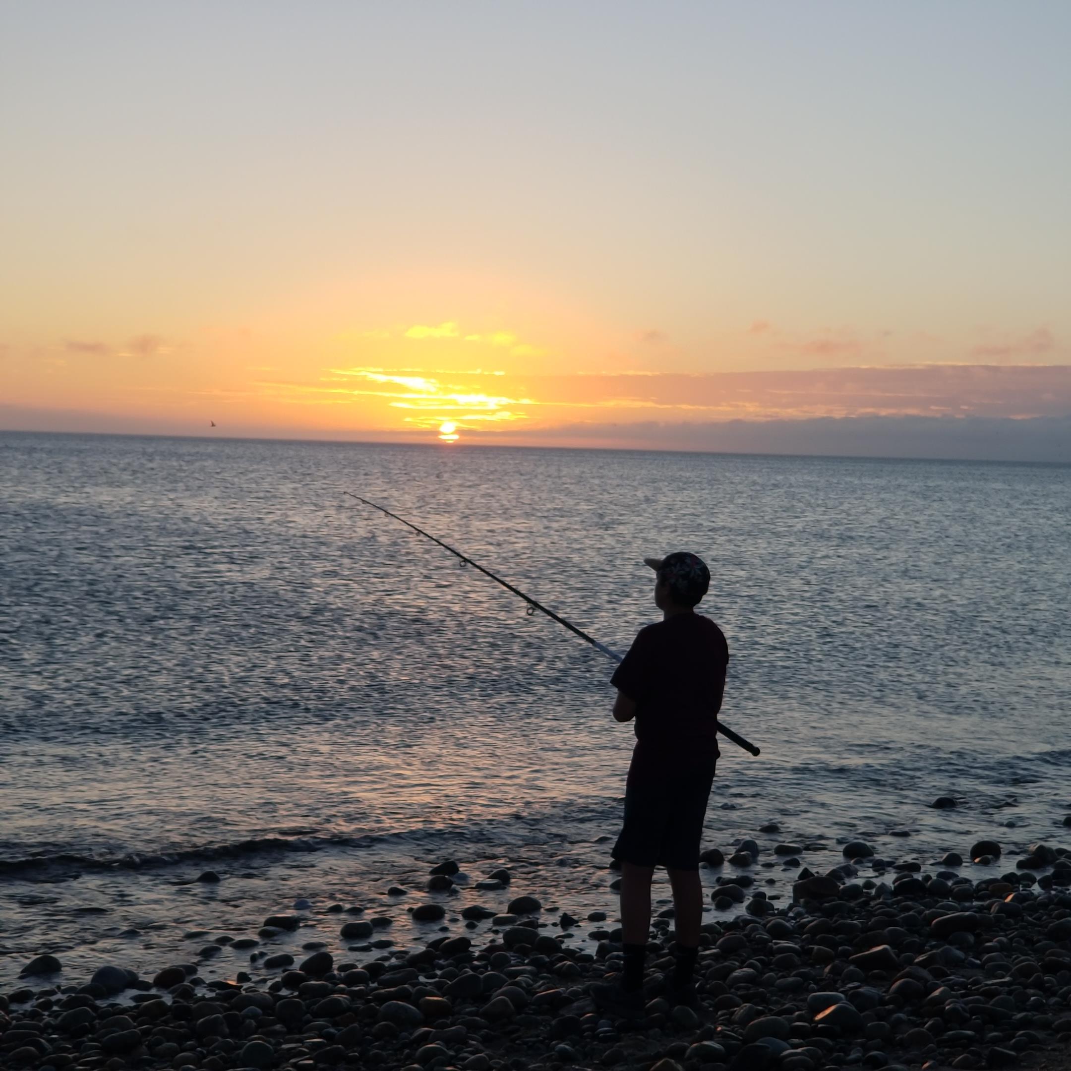 Fishing at sunrise at Town Neck Beach, Sandwich, M...