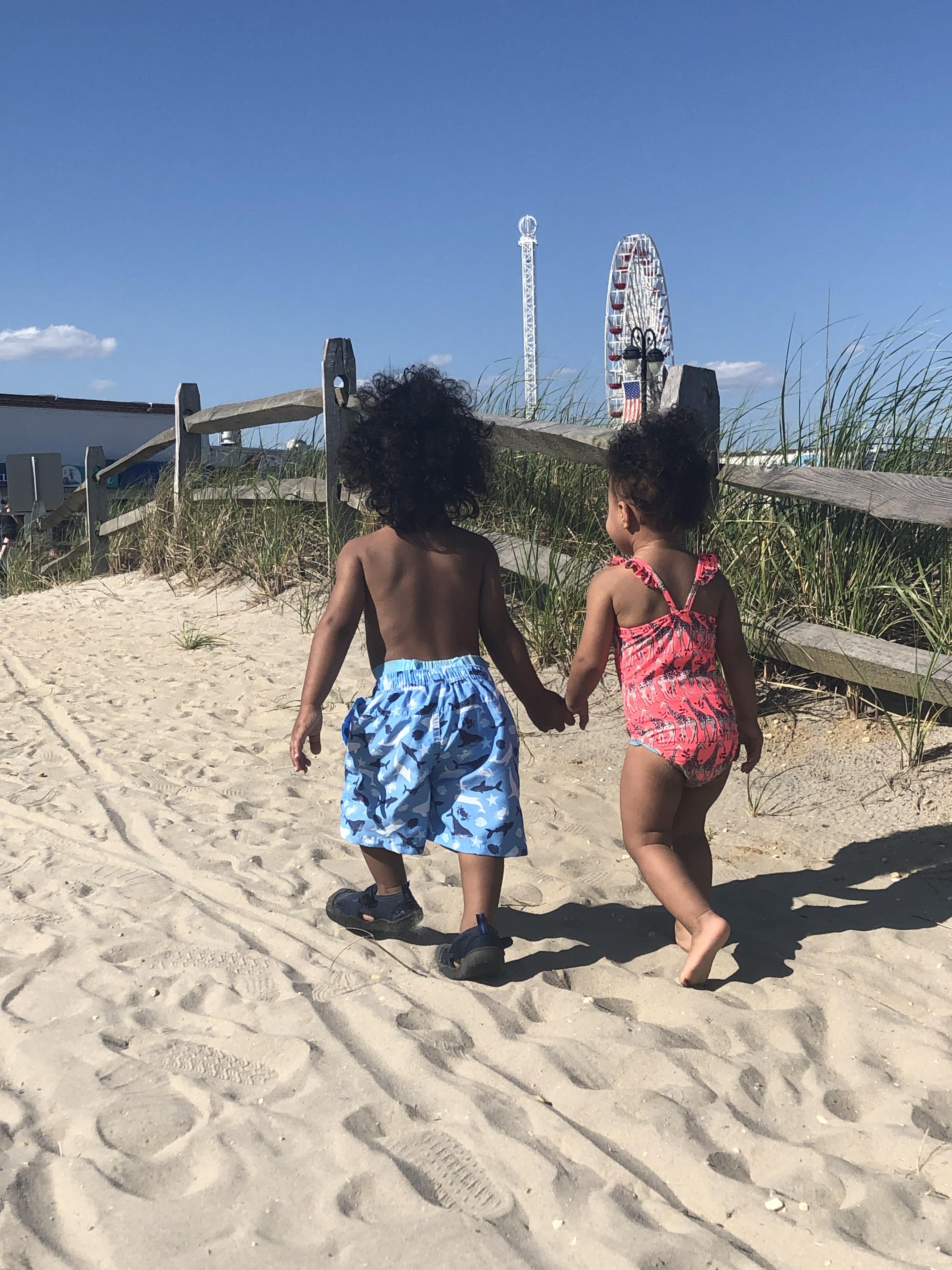 Twins He’s holding his sisters hand as we leave th...